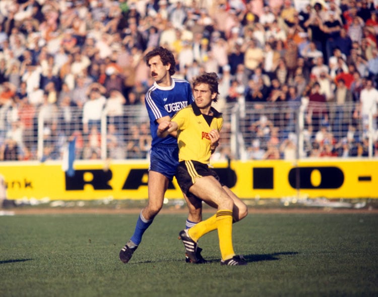 Augustin durfte f&#252;r Dortmund am 5. Spieltag der Saison 1978/79&#9;gegen den VfB Stuttgart (4:3) ran und bedankte sich im Alter von 17 Jahren und 347 Tagen mit einem Tor.