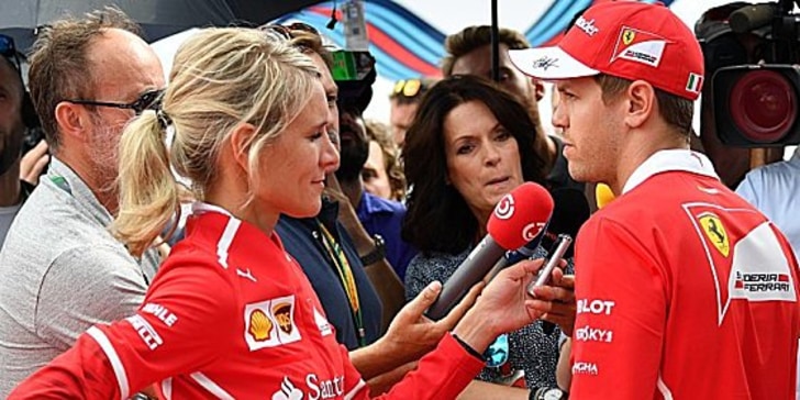 Gastspiel in Österreich: Sebastian Vettel mit seiner Pressesprecherin Britta Röske.