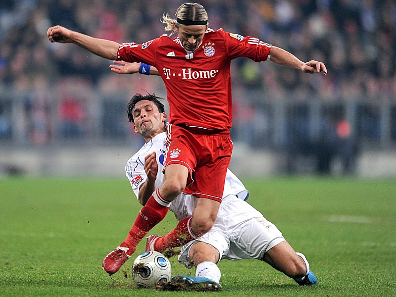 Wiedersehen in Moskau? Tymoshchuk und Kuranyi, hier noch im Bundesligaduell im November 2009.
