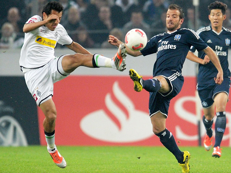 Mittelfelstrategen: HSV-Superstar Rafael van der Vaart (re.) traf, Gladbachs Juan Arango bereitete den sp&#228;ten Ausgleich vor.