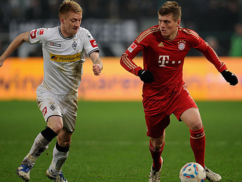 Duell der Giganten: Marco Reus hat die Bayern (hier Toni Kroos) mit Gladbach zuletzt zweimal geschlagen.