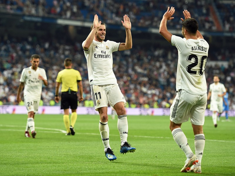 Starke Kombination: Gareth Bale feiert sein Tor mit Vorlagengeber Marco Asensio.