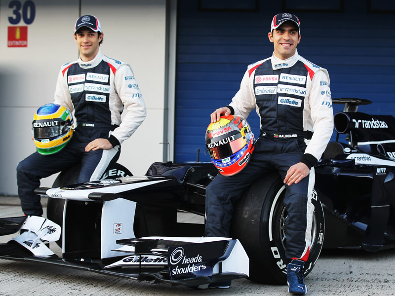 Der neue Williams FW34: Das Fahrerduo Bruno Senna und Pastor Maldonado bei der Pr&#228;sentation in Jerez. 