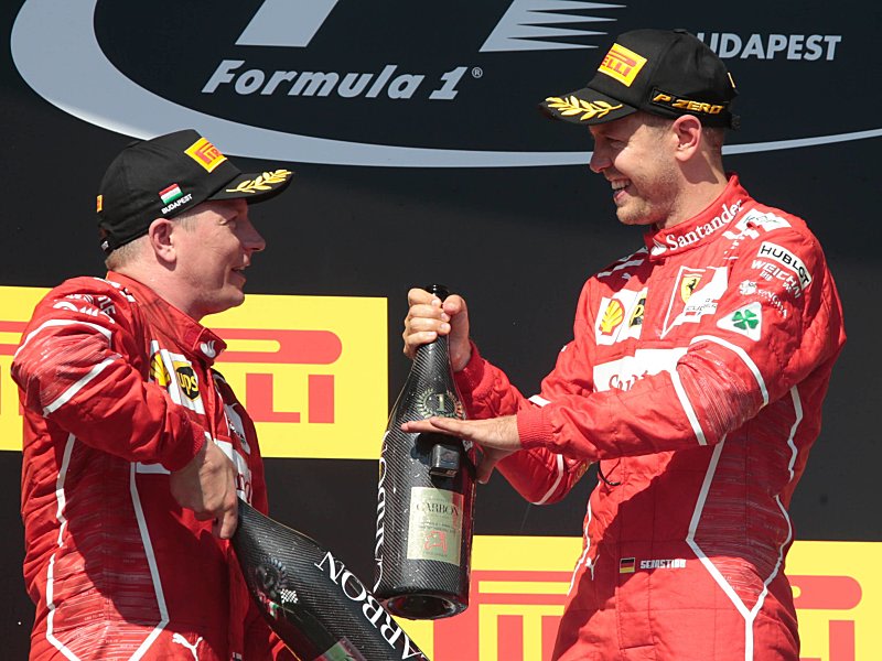 &quot;Ferrarissima&quot;: Kimi R&#228;ikk&#246;nen und Sebastian Vettel feiern in Budapest.