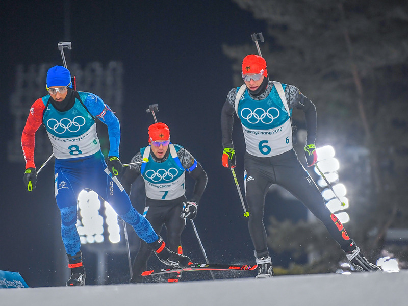 Benedikt Doll, Simon Schempp und Martin Fourcade (v.r.)