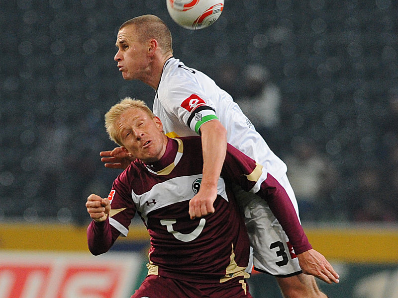 Stemmen sich ab sofort gemeinsam gegen den drohenden Abstieg: Mike Hanke und Filip Daems - der Hannoveraner Stürmer geht zur Borussia.