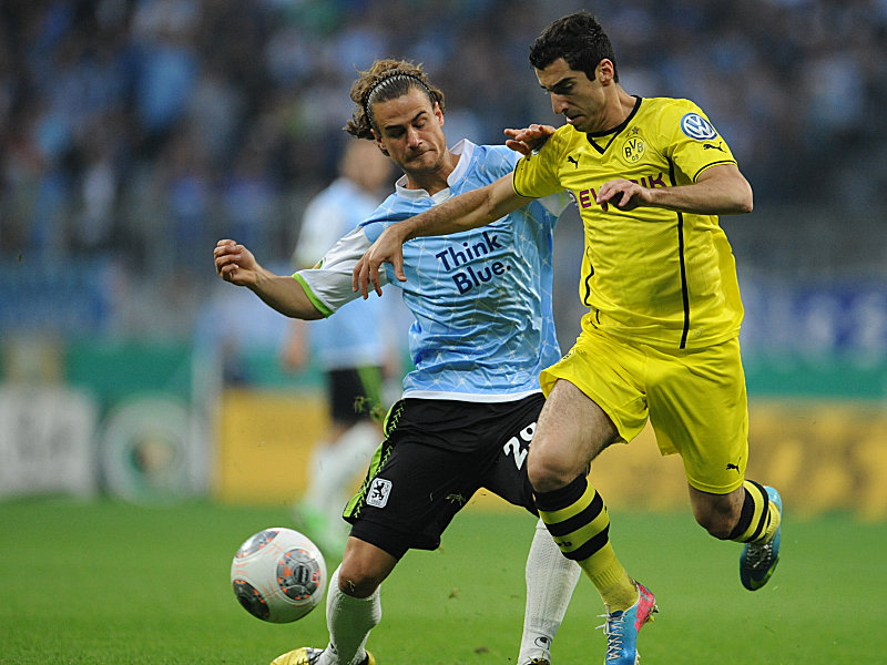 Gut gestört: Löwe Yannick Stark bearbeitet BVB-Star Henrikh Mkhitaryan.