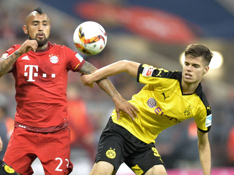 Sind in der aktuellen kicker-Rangliste "Mittelfeld defensiv" vorn dabei: Arturo Vidal (l.) und Julian Weigl.