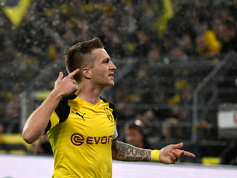 Die Ohren gespitzt: BVB-Kapitän Marco Reus & Co. ließen den Signal-Iduna-Park beben.