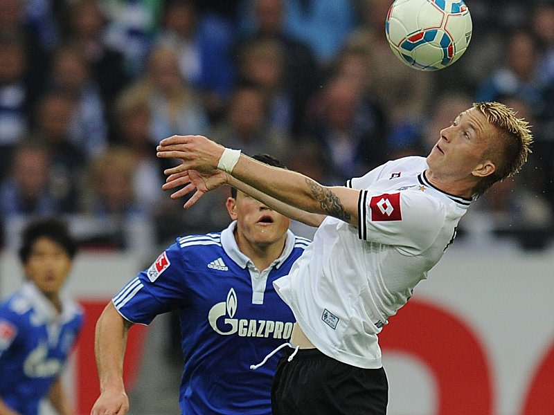 Gladbachs Marco Reus und Schalkes Kyriakos Papadopoulos.