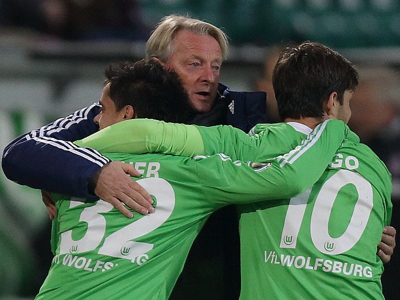 Lorenz-Günther Köstner, Fagner, Diego (alle VfL Wolfsburg)