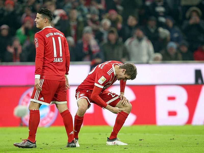 Spielen eine gute Runde. James und Thomas Müller (re.).