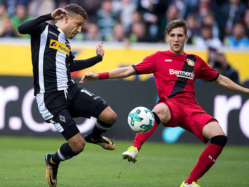 Fabian Johnson, Panagiotis Retsos (re.)