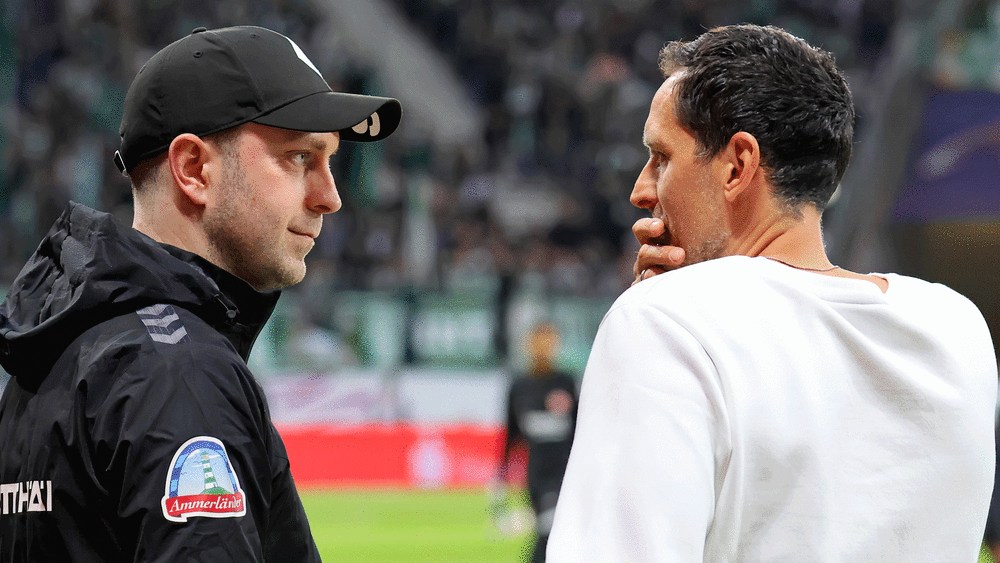 Bremens Trainer Ole Werner (li.) und Frankfurt-Coach Dino Toppmöller