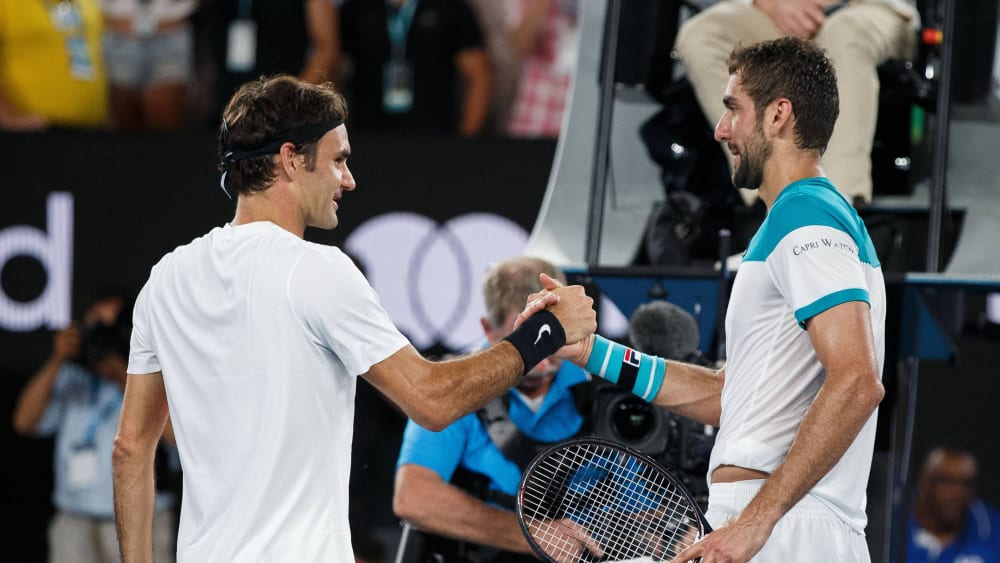 Roger Federer und Marin Cilic (re.).