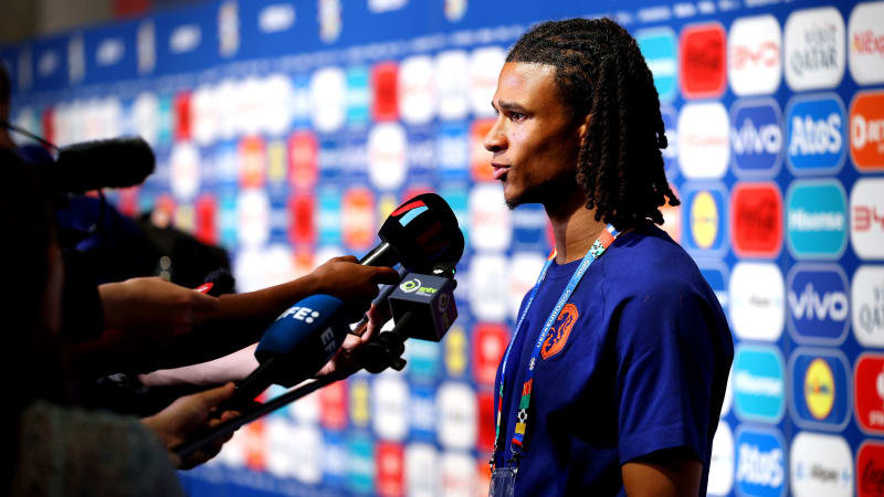 BERLIN, GERMANY - JUNE 25: Nathan Ake of the Netherlands  speaks to the media in the flash interview after the UEFA EURO 2024 group stage match between Netherlands and Austria at Olympiastadion on June 25, 2024 in Berlin, Germany. (Photo by Boris Streubel - UEFA/UEFA via Getty Images)