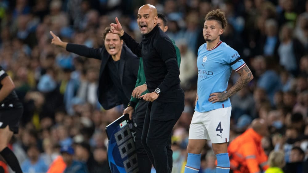 Beschwerte sich über den Fitnesszustand von Kalvin Phillips (re.) nach dessen Rückkehr aus Katar: ManCity-Coach Pep Guardiola.