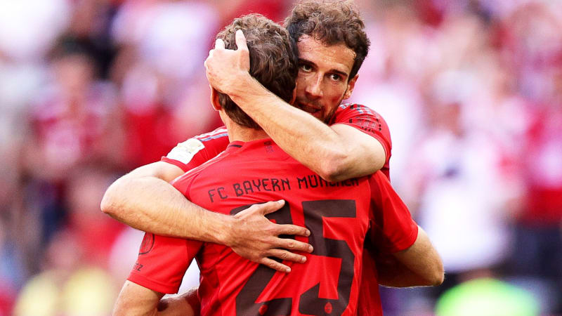 MUNICH, GERMANY - MAY 12: Leon Goretzka of FC Bayern München (R) celebrates with teammate Thomas Müller after scoring his teams second goal during the Bundesliga match between FC Bayern München and VfL Wolfsburg at Allianz Arena on May 12, 2024 in Munich, Germany.(Photo by Marcel Engelbrecht - firo sportphoto/Getty Images)