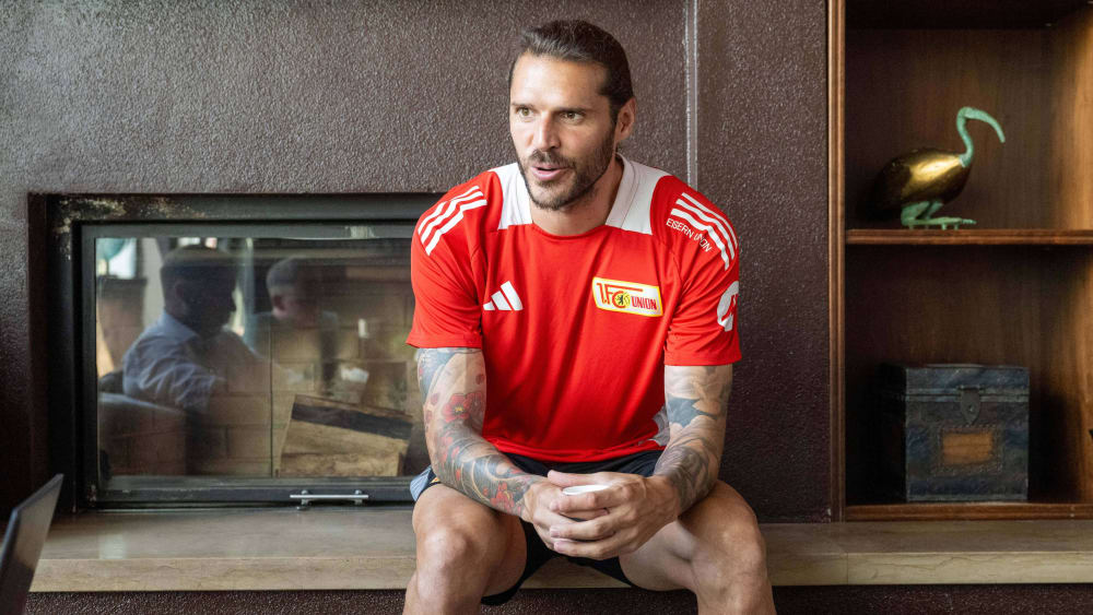 Taking time to speak with the media: Christopher Trimmel.