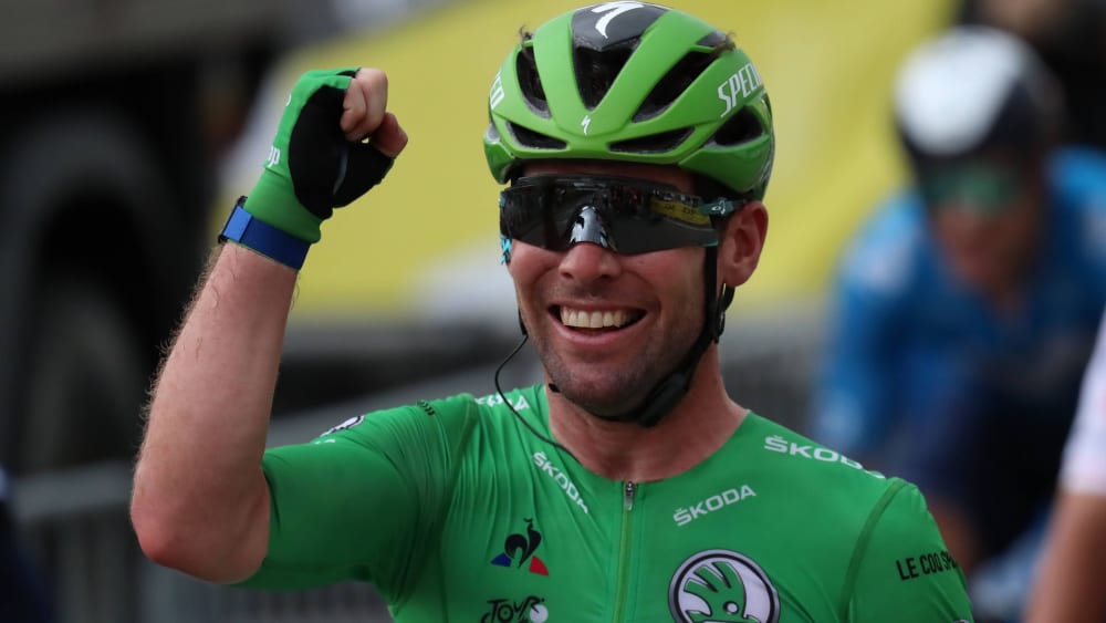 Lieblingspose von Mark Cavendish: Siegesjubel im Grünen Trikot des besten Sprinters der Tour de France, hier im Jahr 2021.