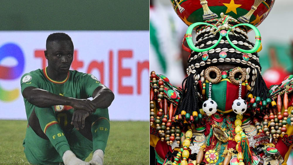 Sadio Mané (li.) konnte mit Favorit Senegal nicht lachen - im Gegensatz zu diesem Fan aus Burkina Faso.