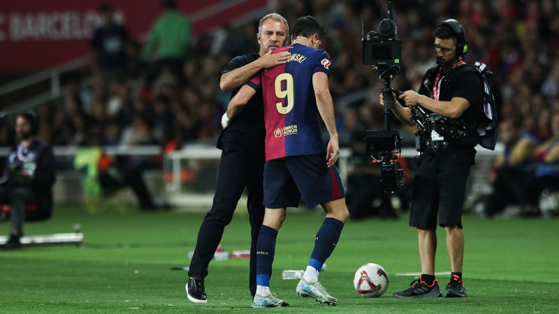 Robert Lewandowski of FC Barcelona and Hansi Flick, coach of FC Barcelona, during the La Liga EA Sports match between FC Barcelona and Getafe CF at Estadi Lluis Companys in Barcelona, Spain, on September 25, 2024. (Photo by Gongora/NurPhoto)