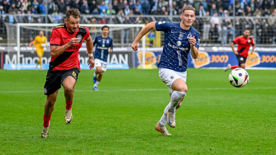 Intensives Duell im Münchner Regen: Florian Bähr im Sprint-Vergleich mit Thijmen Goppel (li.).