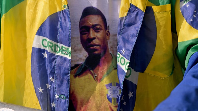 SANTOS, BRAZIL - JANUARY 02: Pele fan Antonio da Paz queues outside the Urbano Caldeira Stadium ahead of football legend Pele's funeral, which begins later this morning at the stadium on January 02, 2023 in Santos, Brazil. Brazilian football icon Edson Arantes do Nascimento, better known as Pele, died on December 29, 2022 aged 82 after a battle with cancer in Sao Paulo, Brazil. The three-time World Cup champion with Brazil is considered one of the greatest football legends of all time. (Photo by Pedro Vilela/Getty Images)