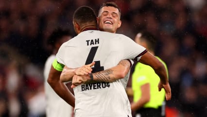 18th April 2024; London Stadium, London, England; Europa League Football, Quarter Final, Second Leg, West Ham United versus Bayer Leverkusen; Granit Xhaka of Bayer Leverkusen celebrates with Jonathan Tah PUBLICATIONxNOTxINxUK ActionPlus12631879 ShaunxBrooks