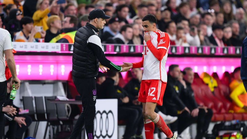 MUNICH, GERMANY - MARCH 30: Jamal Musiala of Munich while his exchange with Head Coach Thomas Tuchel during the Bundesliga match between FC Bayern München and Borussia Dortmund at Allianz Arena on March 30, 2024 in Munich, Germany. (Photo by Markus Gilliar - GES Sportfoto/Getty Images) (Photo by Markus Gilliar - GES Sportfoto/Getty Images)