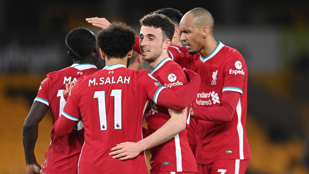 Jubeltraube in Rot: Diogo Jota & Co. feiern Liverpools Treffer zum 1:0. 