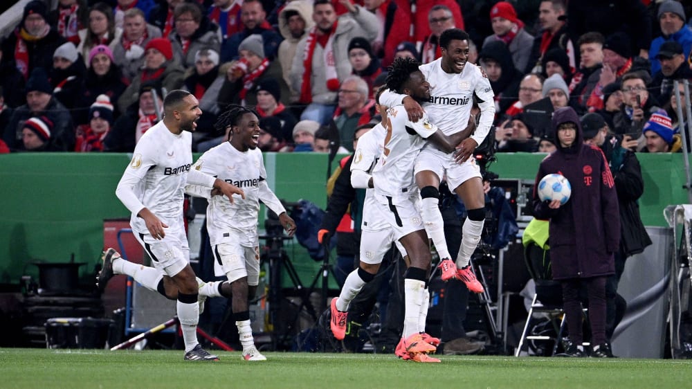 Nathan Tella (right) is celebrated as the match winner.