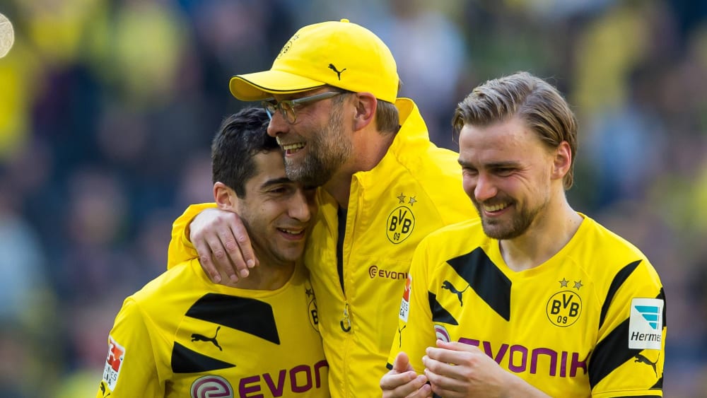 Henrikh Mkhitaryan (li.), Jürgen Klopp (Mi.) und Marcel Schmelzer (re.)