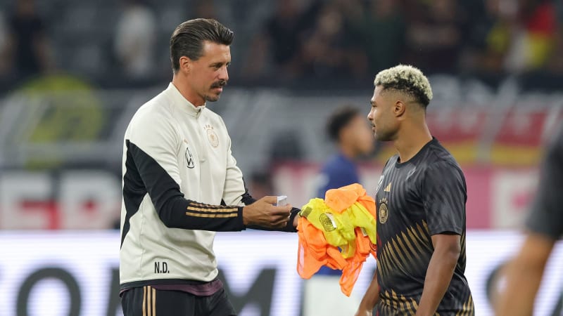DORTMUND, GERMANY - SEPTEMBER 12: (LR) Assistant coach Sandro Wagner of Germany with Serge Gnabry of Germany ahead of the international friendly match between Germany and France at Signal Iduna Park on September 12, 2023 in Dortmund, Germany. (Photo by Sebastian El-Saqqa - firo sportphoto/Getty Images)