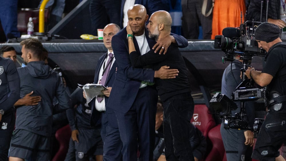 Know each other well: Vincent Kompany and Pep Guardiola.
