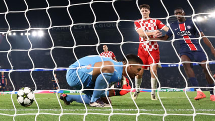 Girona's Argentine goalkeeper #13 Paulo Gazzaniga (C) concedes Paris Saint-Germain's first goal during the UEFA Champions League 1st round day 1 football match between Paris Saint-Germain (PSG) and Girona FC at the Parc des Princes Stadium, in Paris, on September 18, 2024. (Photo by Franck FIFE / AFP) (Photo by FRANCK FIFE/AFP via Getty Images)