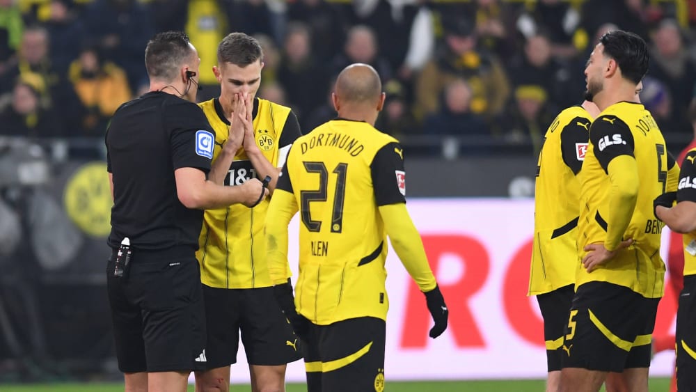 Harry Kanes Injury Scare A Dramatic Return from Dortmund with Bayerns Medical Team