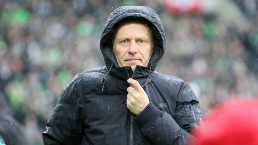 Christian Streich im Regen.