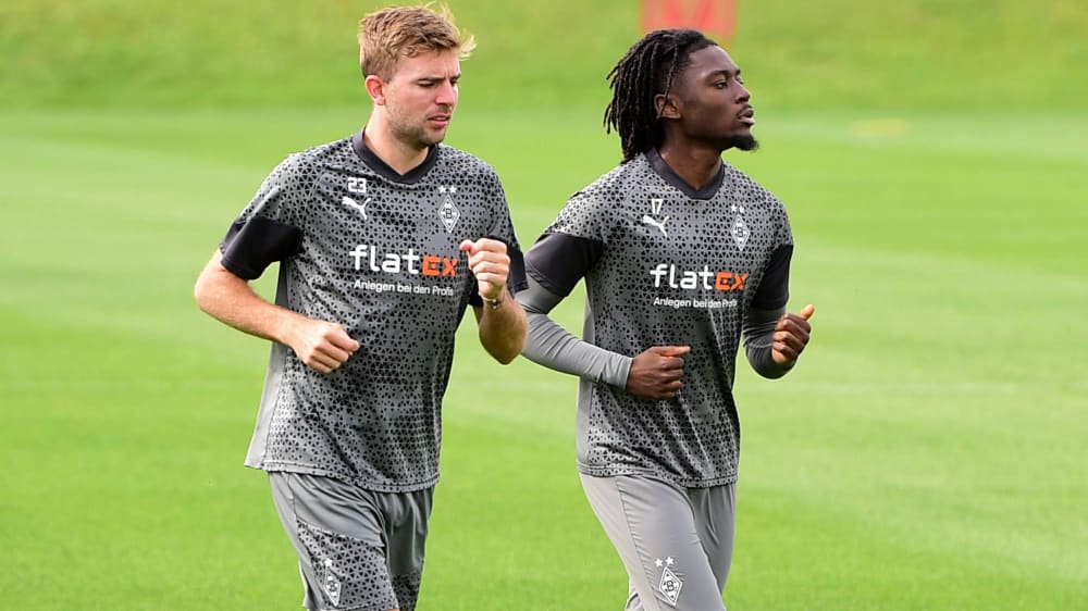 Christoph Kramer (li.) ist zurück im Gladbacher Mannschafttraining, Kouadio Koné ist dagegen noch nicht so weit.