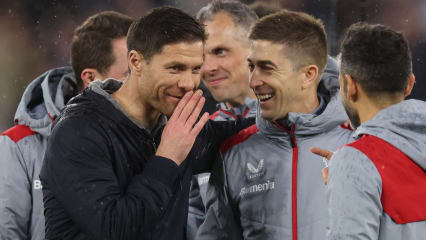 LONDON, ENGLAND - APRIL 18: Xabi Alonso Head Coach / Manager of Bayer Leverkusen celebrates with the coaching staff after the UEFA Europa League 2023/24 Quarter-Final second leg match between West Ham United FC and Bayer 04 Leverkusen at Olympic Stadium on April 18, 2024 in London, England.(Photo by Catherine Ivill - AMA/Getty Images)