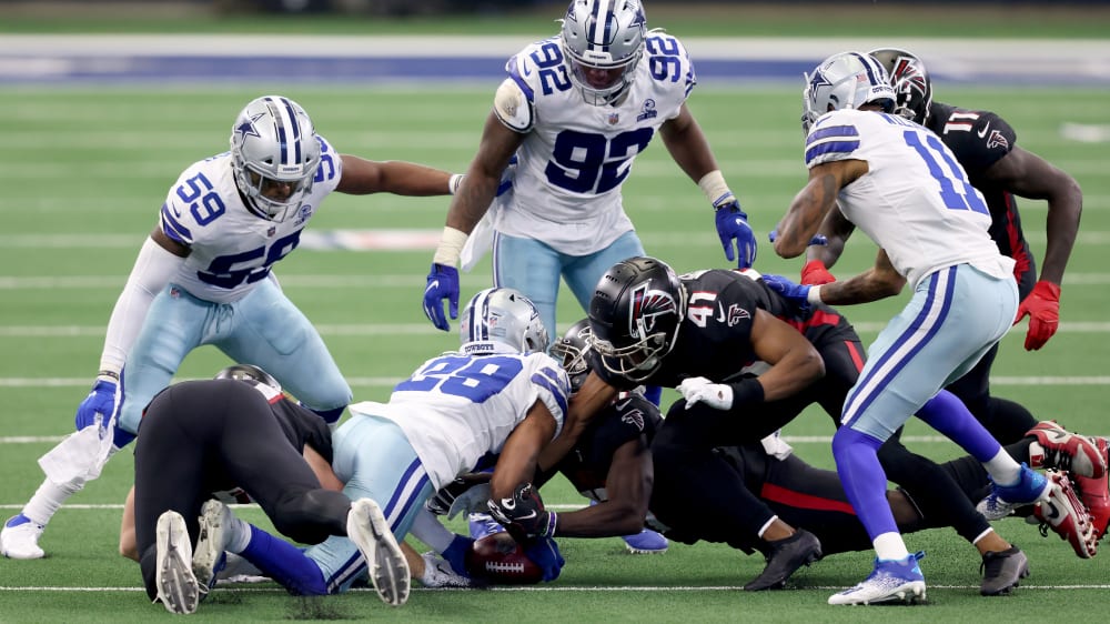 Der entscheidende Moment gegen die Atlanta Falcons: Die Dallas Cowboys erobern den Onside Kick.
