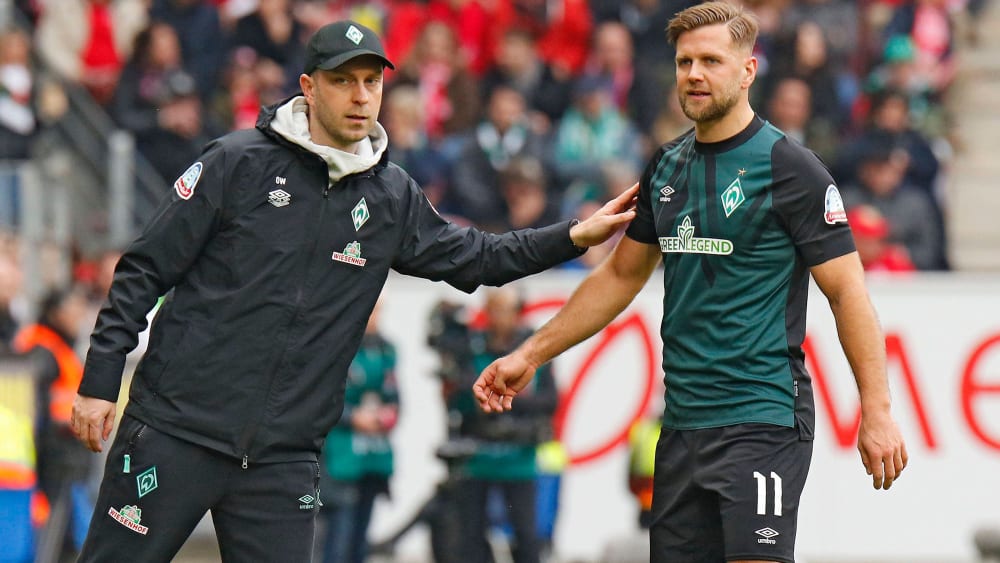 Gesichter des SV Werder: Trainer Ole Werner (li.) mit Goalgetter Niclas Füllkrug.