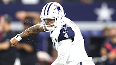ARLINGTON, TEXAS - SEPTEMBER 20: Dak Prescott #4 of the Dallas Cowboys celebrates after a touchdown pass against the Washington Commanders in the fourth quarter of a game at AT&T Stadium on September 20, 2026 in Arlington, Texas. (Photo by Stacy Revere/Getty Images)