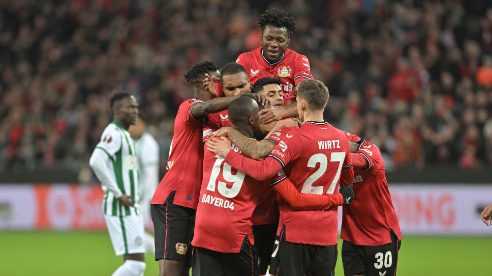 Leverkusen players celebrating a goal against Ferencvaros in the Europa League Round of 16 Leg 2