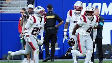 Oct 4, 2026; Orchard Park, New York, USA;  New England Patriots safety Craig Woodson (4) celebrates an interception during the fourth quarter against the Buffalo Bills at New Highmark Stadium.  Mandatory Credit: Gregory Fisher-Imagn Images