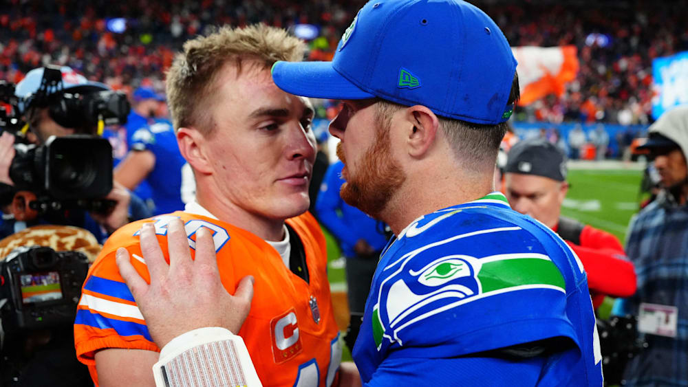 Sam Darnold (r., hier mit Denvers Quarterback Bo Nix) übernahm nach dem bitteren Ende in Denver die Verantwortung.
