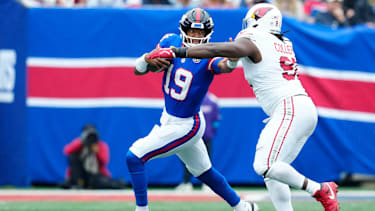 New York Giants quarterback Jameis Winston (19) tries to prevent Arizona Cardinals defensive end L.J. Collier (91) from tackling him, Sunday, October 4, 2026, in East Rutherford.