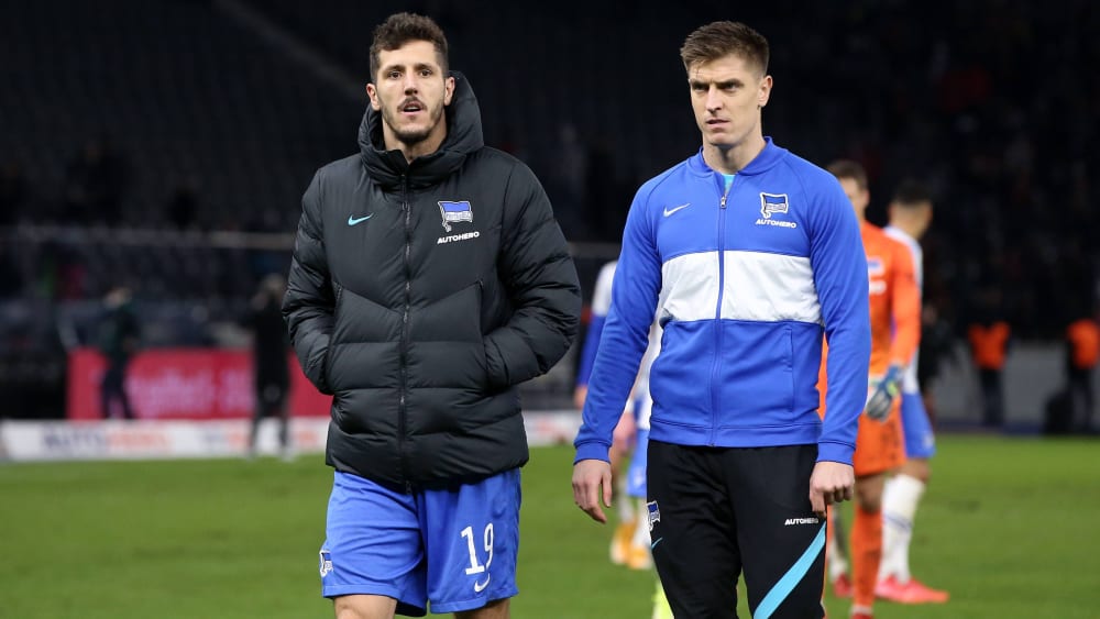One convinced, the other stewed on the bench: Stevan Jovetic (left) and Krzysztof Piatek.