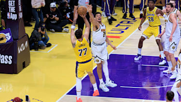 March 14, 2026, Los Angeles, California, USA: Luka Doncic 77 of the Los Angeles Lakers makes the game winning shot during their regular season NBA, Basketball Herren, USA game against the Denver Nuggets on Saturday March 14, 2026 at Crypto.com Arena in Los Angeles, California. Lakers defeat Nuggets, 127-125. ARIANA RUIZ PI Lakers Vs. Nuggets PUBLICATIONxINxGERxSUIxAUTxONLY - ZUMAp124 20260314_zaa_p124_034 Copyright: xArianaxRuizx