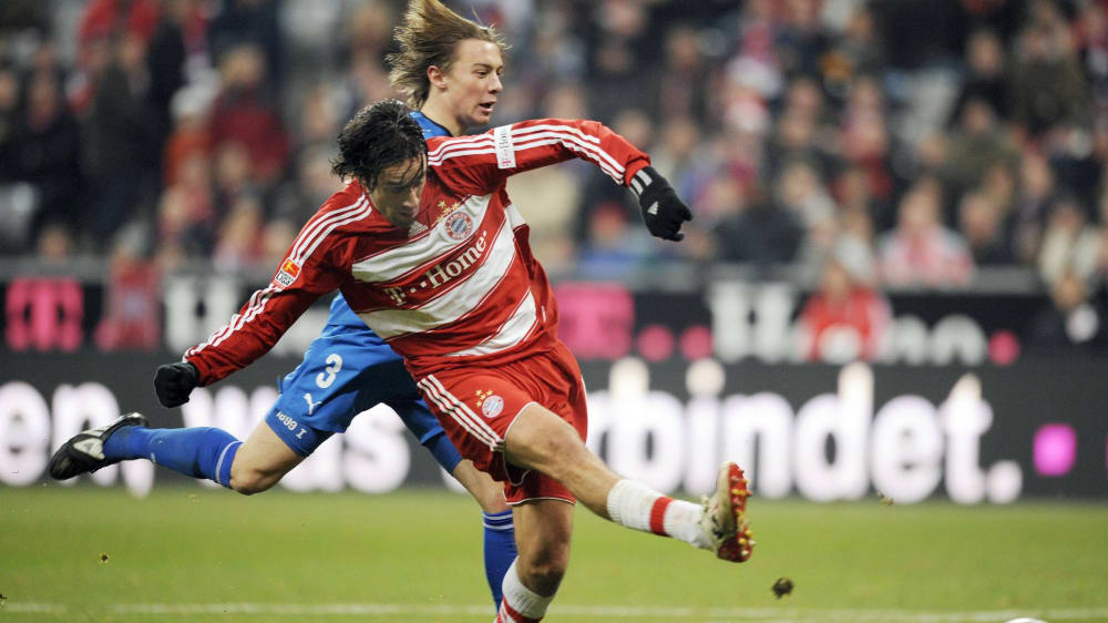 Luca Toni shoots in against Hoffenheim in December 2008 to win 2-1 - Matthias Jaissle (back) comes too late.